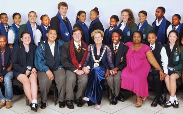 Overstrandâ€™s 2014/2015 Junior Town Council in the company of the Mayor Nicolette Botha-Guthrie and JTC Manager Unity Mtomile. From Hawston Secondary School: Elgermine Fourie (Deputy Jnr. Mayor), Shani Arendse, Sherilene Botha, Reagan Fortuin, Jenny-Lee Hartnick, Agnesia Konstabel and Alfonso Williams (Executive Member). From Hermanus High: Natalie Austin (Executive Member), Elani Groenewald, Amy Hess, Misha van Zyl and Monique Vermeulen (Executive Member). From Qhayiya Secondary School: Jennifer Funda (Executive Member), Zizibele Gashe, Botleng Kayeki, Nezisa Mgqeba,  Zubenathi Sofute,  Athini Tshwalakhe  (Executive Member) and Norman Zininga. From Gansbaai Academia: Johan van der Merwe (Jnr. Mayor), Analo Yawa (Deputy Jnr. Mayor), Marcel Colleen Dickson, Stefan Joubert, Jemaine Jack Julies, Amy Thandi Wolhuter and Khanya Xhalisile. From Northlink College: Nicole Blignaut, Hope Botes, Matthew Jones and Ignesius Matema (Executive Member). From Curro Hermanus: Inez Mallandain (Executive Member) and Tyde-Summer Turck.